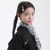 李珞桐飾演幼年塗山玖的演員頭像